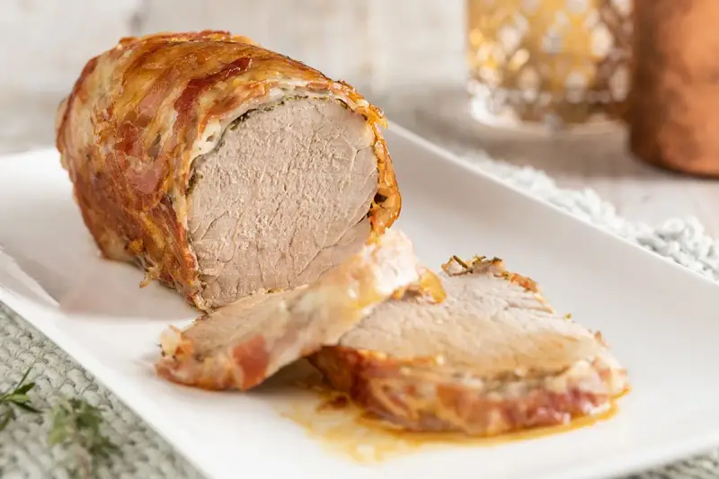 Filetto di maiale avvolto nel bacon, un'idea gustosa per le tue ricette.